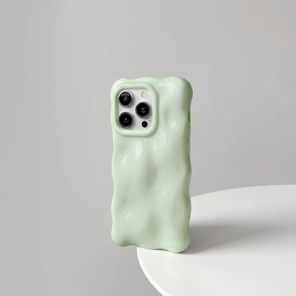 Mint green 3D wavy silicone case with a soft gummy feel, perfect for a fresh aesthetic.