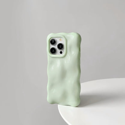Mint green 3D wavy silicone case with a soft gummy feel, perfect for a fresh aesthetic.