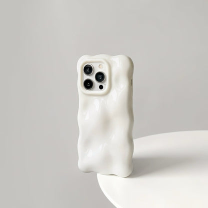 Cream white 3D wavy silicone case with a soft gummy feel, perfect for a fresh aesthetic.