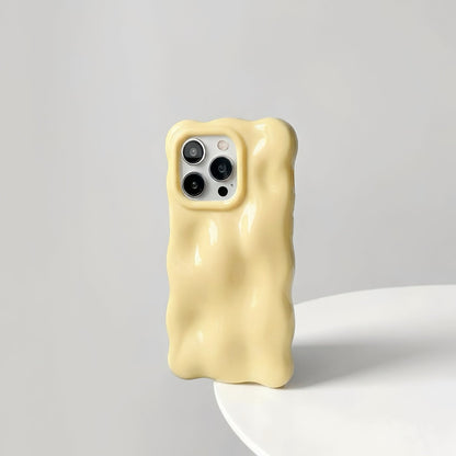 Butter yellow gummy wave phone case featuring a trend-setting 3D texture and impact protection.