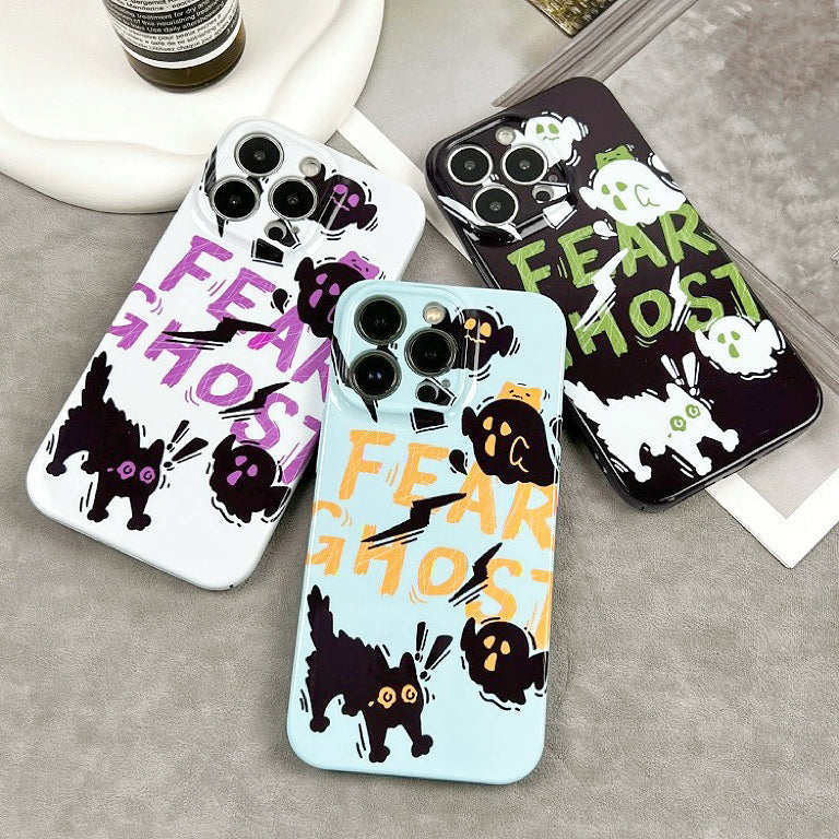 FEAR GHOST text and minimalist cat designs on silicone cases. Whimsical Halloween aesthetic.