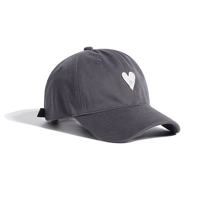 Grey cotton twill cap with white heart embroidery on a white background.