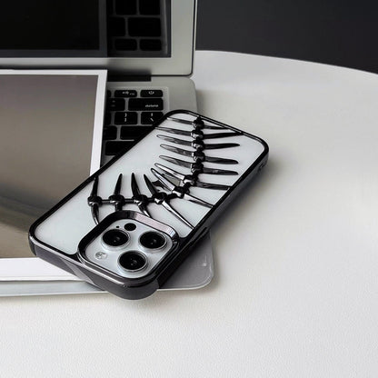 Close-up of Hollow Fishbone Phone Case in polish black, showcasing the detailed artistic hollow craftsmanship.