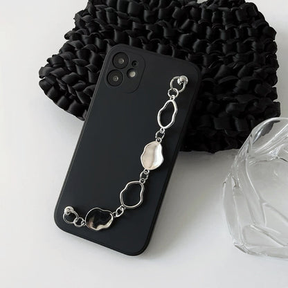 Black silicone case with a silver irregular metal chain wrist strap. Stylish urban techwear accessory.