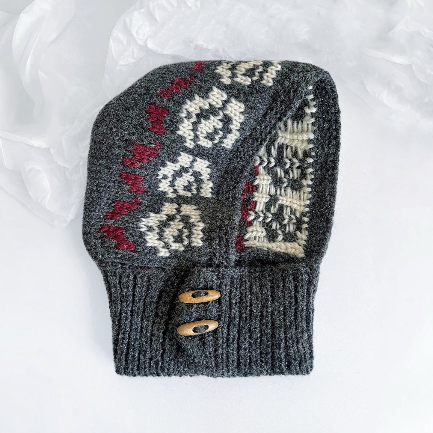Front view of Jacquard Knitted Balaclava in grey, featuring an intricate wool-blend knit for a soft, warm fit.
