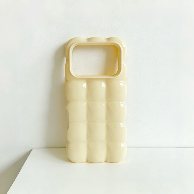 Close-up of a cream yellow jelly bubble phone case with  a macaron hues.