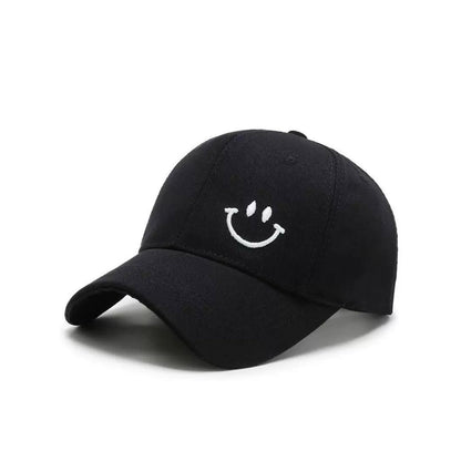 Front view of Joyful Grin Cap, displays iconic smile graphic embroidered on a durable and skin-friendly frame.