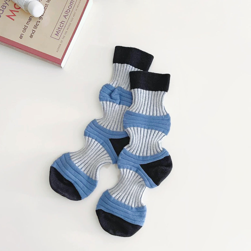 Front view of Lantern Colored Socks in light blue, easy to pack for travel and errands.