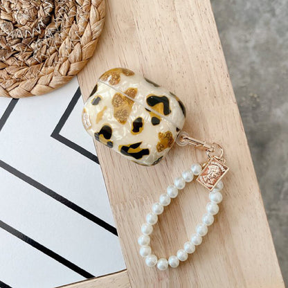 Front view of Leopard Print AirPods Case Cover with beaded strap, ideal for gifting and everyday use.