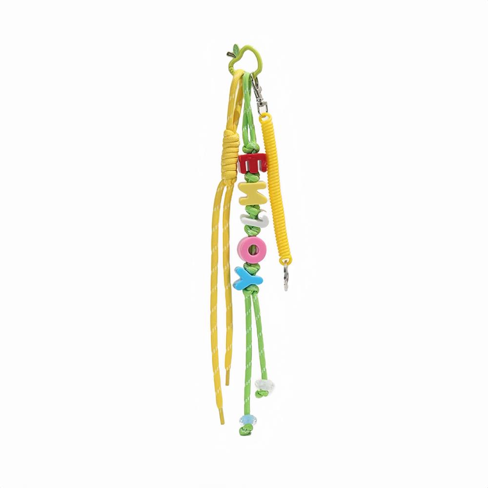 Close-up of Letters Bag Charm LUCKY letters and yellow ropes , ideal for travel and daily use.