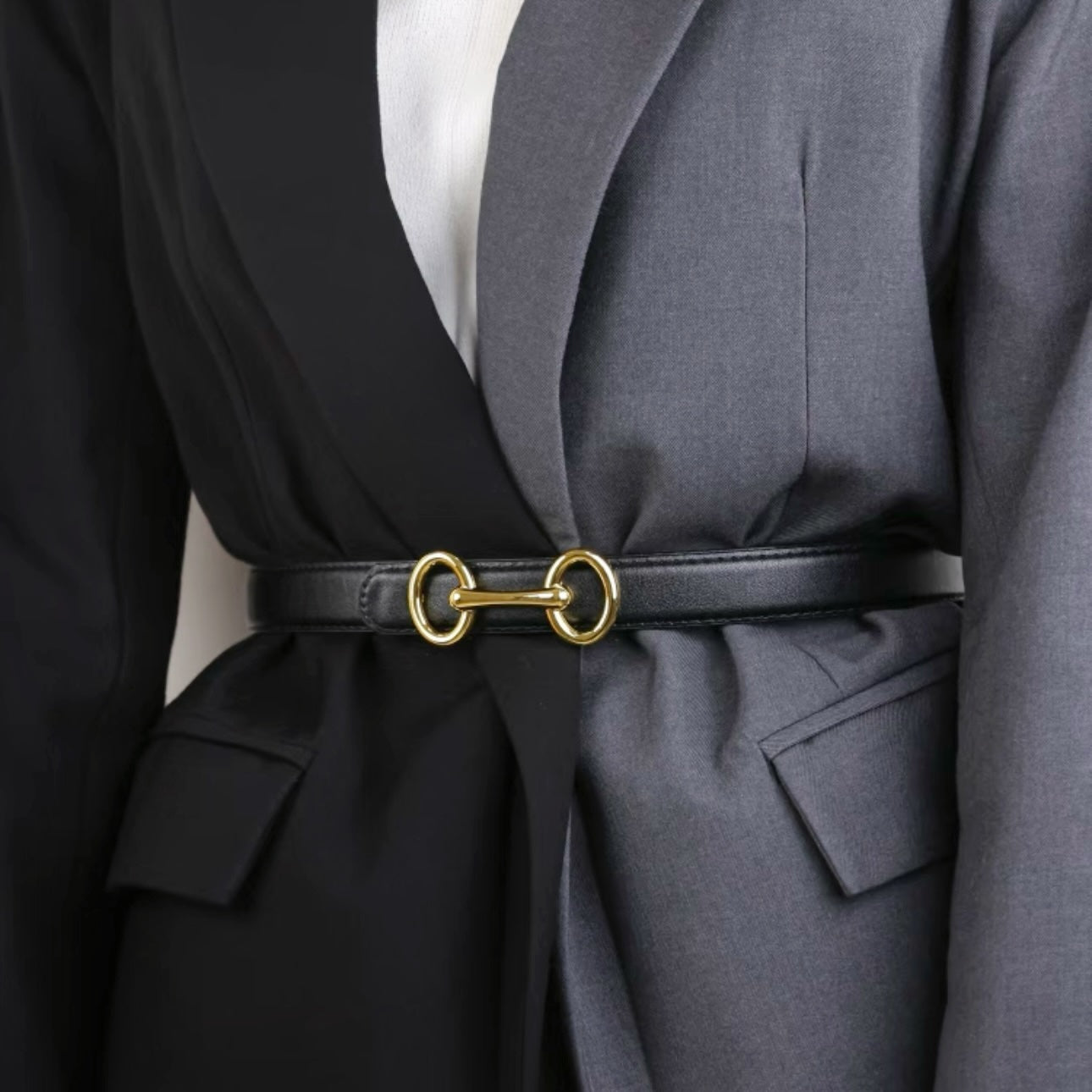 Model wearing the black linked loop belt for minimalist daily outfit.