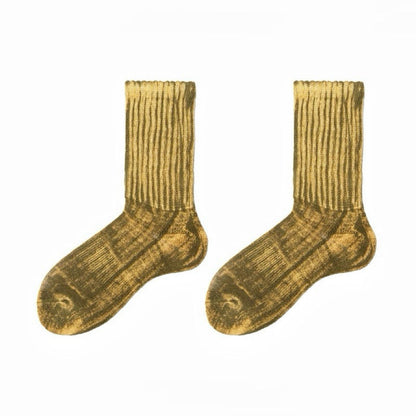 Front view of Metallic Tie Dye Slouch Socks in golden, easy to pack for travel and errands.