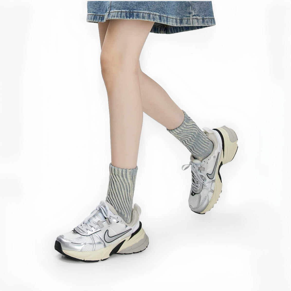 Model wearing a pair of  Metallic Tie Dye Slouch Socks in gray, great for daily wear and lounging.
