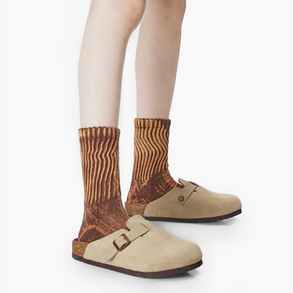 Model wearing a pair of tan cotton socks, great for casual wear and light workouts.