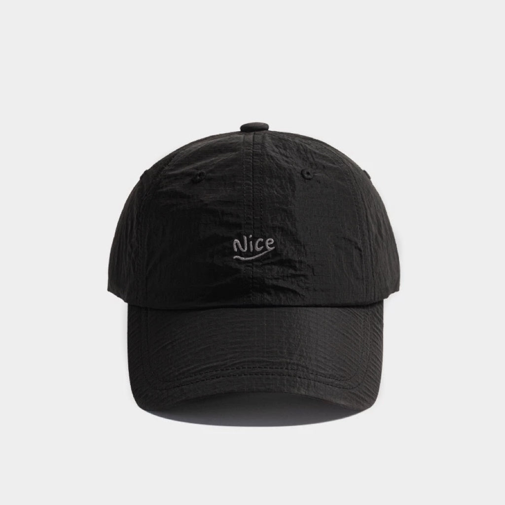 Front flat view of the versatile black quick dry running cap for timeless techwear and outdoor gear