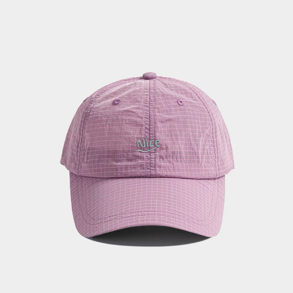 Front flat view of the dusty pink performance cap for outdoor gear and sports styling
