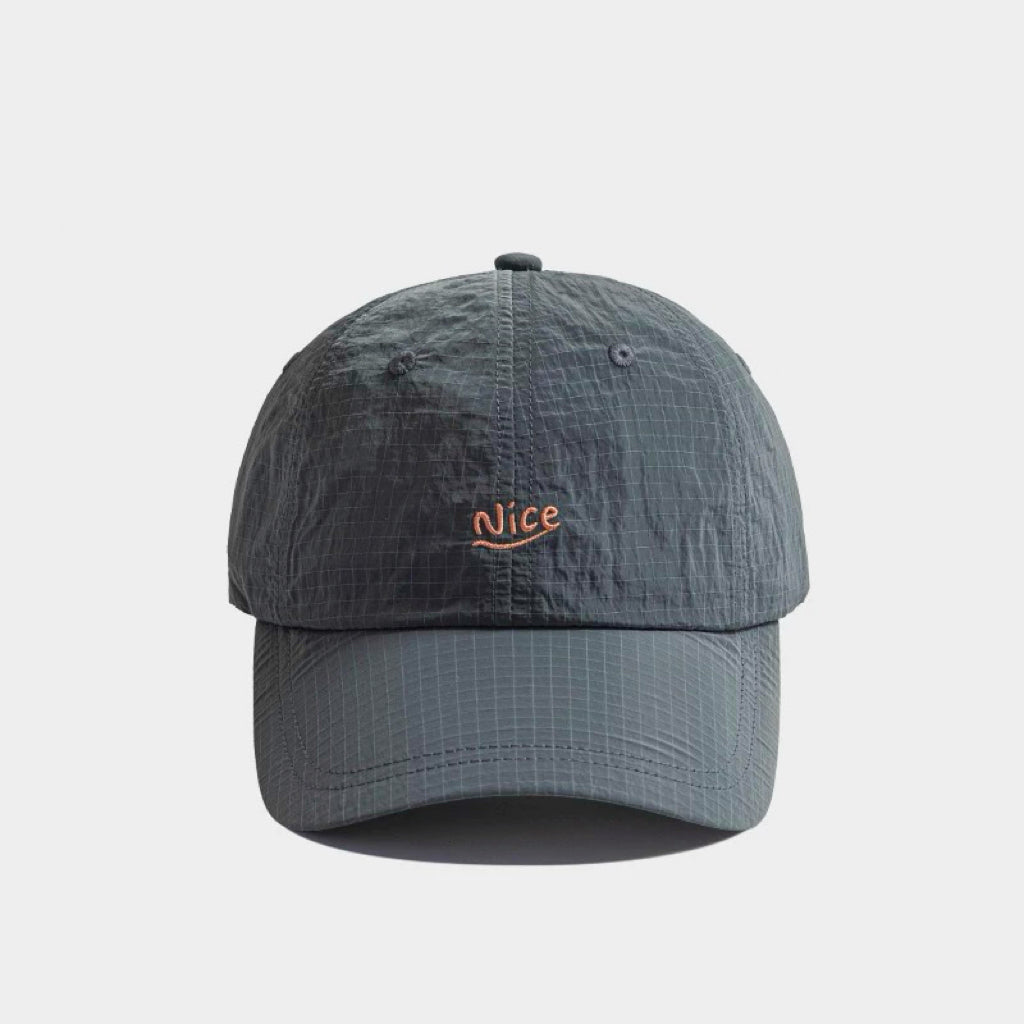 Front flat view of the steel grey textured quick dry cap with adjustable back closure