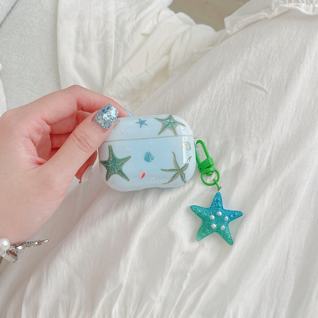 Model Hands holding a Oceanic Star Charm Airpods Case Cover,easy to carry for commutes and travel.
