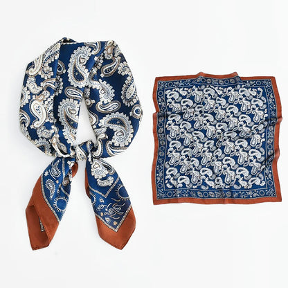 Set of blue and white silk-blend scarves with intricate paisley motifs.