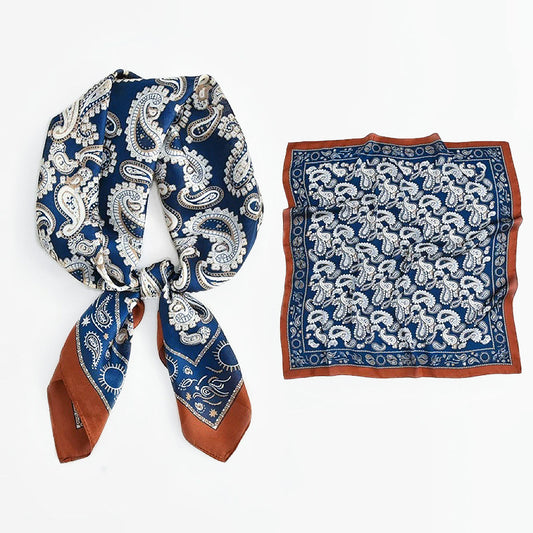 Set of blue and white silk-blend scarves with intricate paisley motifs.