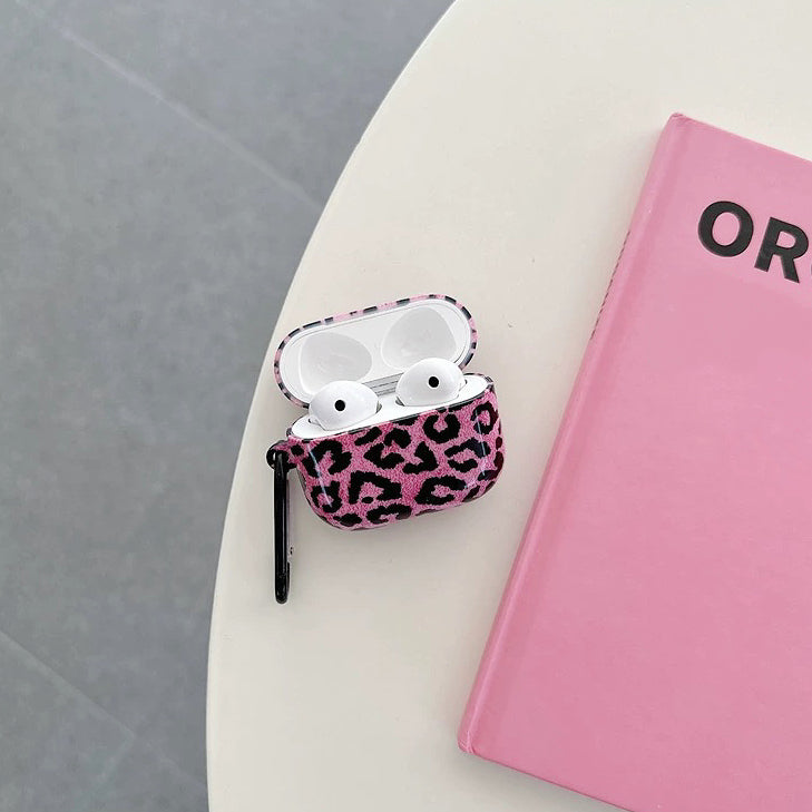 Angled view of Pink Leopard Print Airpods Case Cover, easy to carry for commutes and errands.