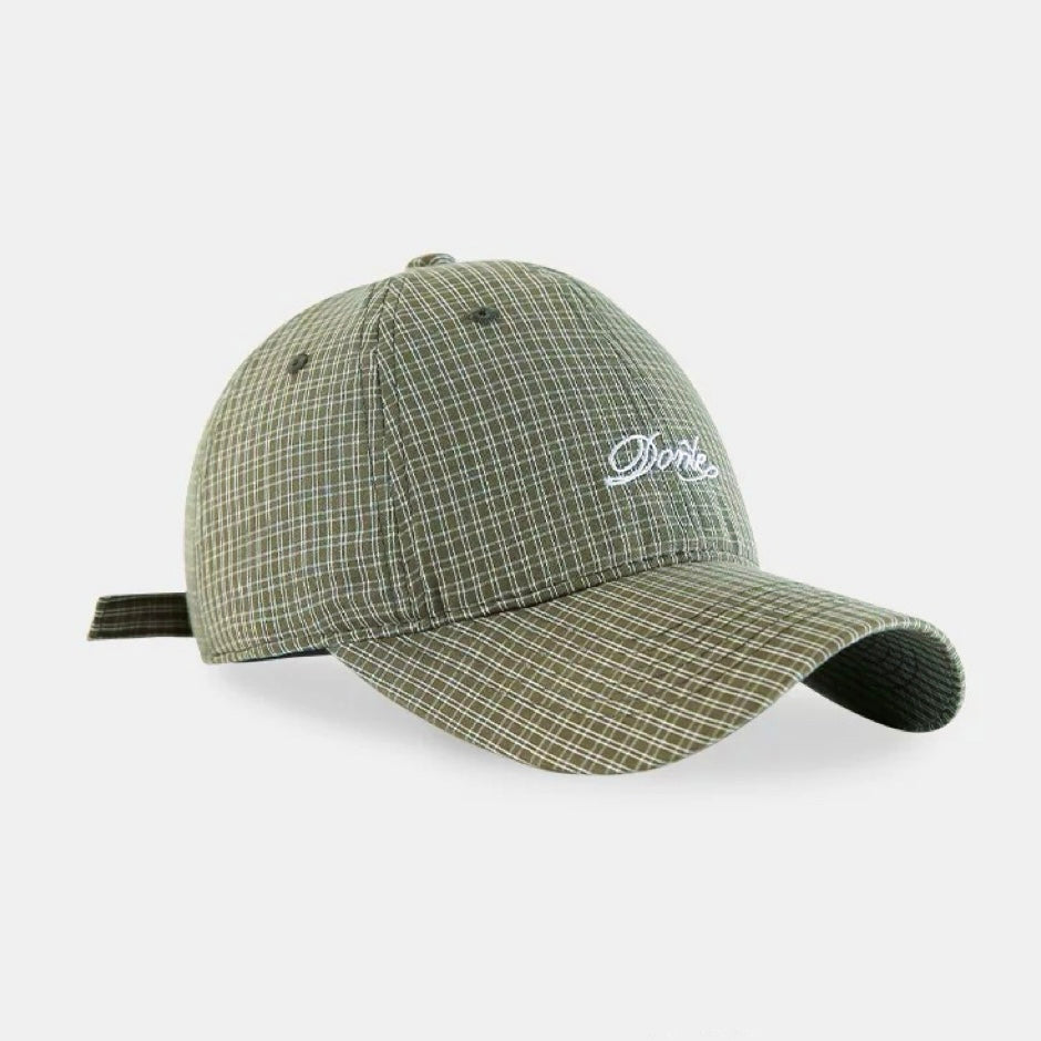 Front view of green Plaid Chill Cap, features traditional plaid motifs on a premium, breathable cotton base.
