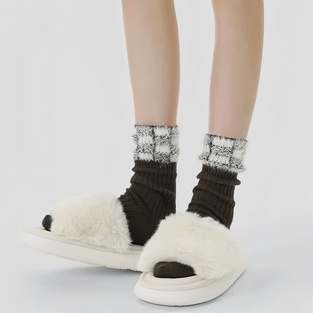 Model wearing a pair of brown plaid cotton socks, great for casual wear and light workouts.