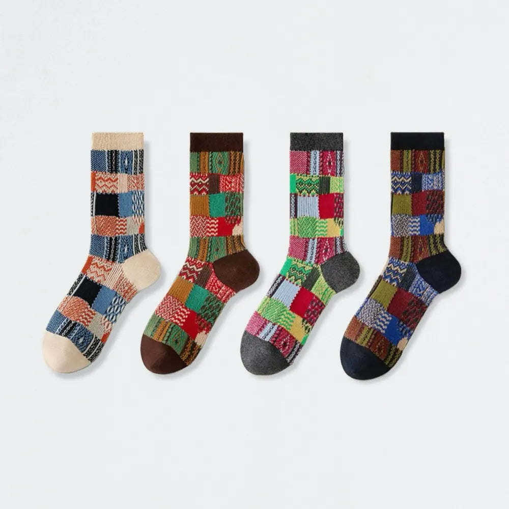 Flat lay of 4 pairs of Plaid Patchwork Socks, great for daily wear and lounging.