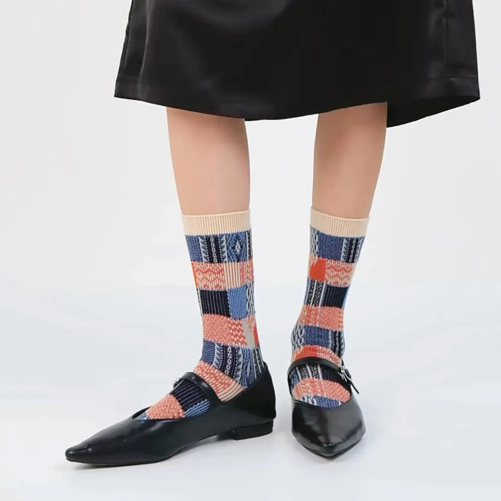 Model wearing a pair of  Plaid Patchwork Socks in beige, great for daily wear and lounging.