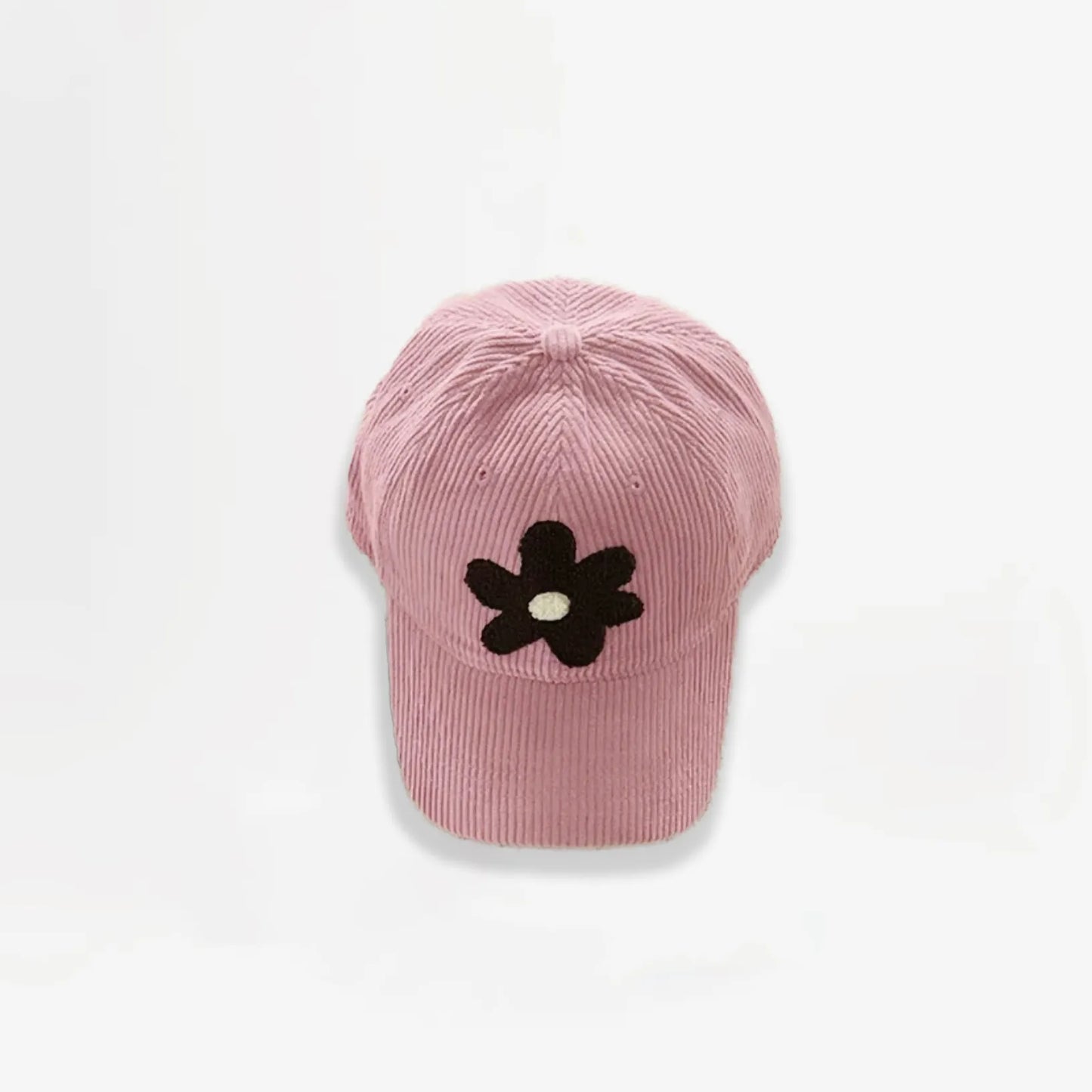 Pink corduroy baseball cap featuring a brown plush flower embroidery.