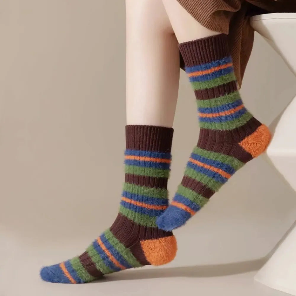 Model wearing a pair of Plush Striped Socks in brown, easy to pack for travel and errands.