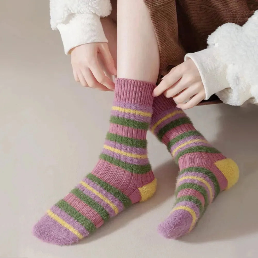 Model wearing a pair of purple Plush Striped Socks, great for casual wear and light workouts.