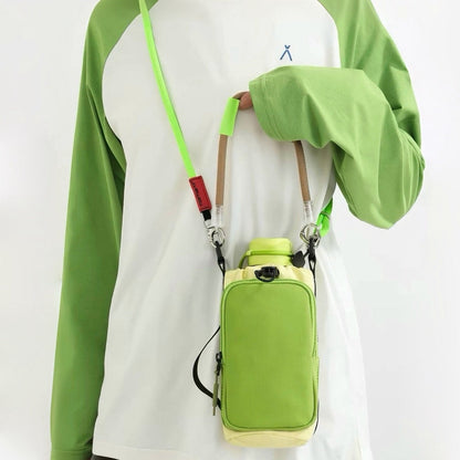 Model wearing a lime green sweatshirt displaying the vibrant green utility bottle carrier across the chest.
