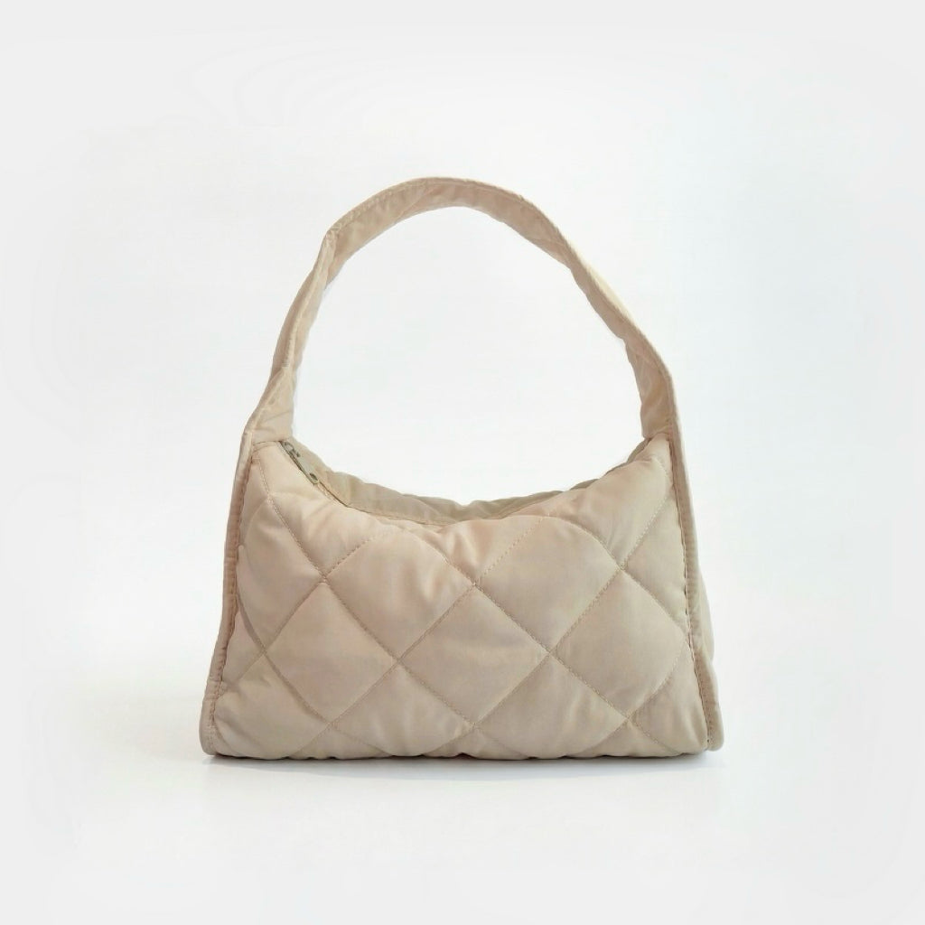 Front view of the khaki argyle quilted hobo bag with a cloud-like texture.