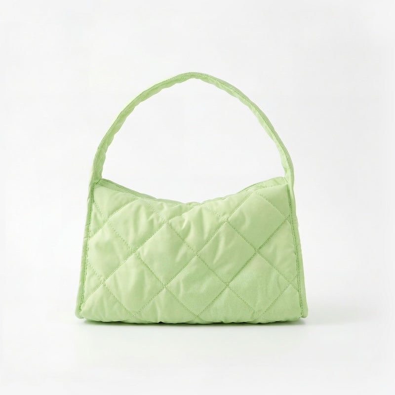 Front view of the lime green argyle quilted hobo bag with a cloud-like texture.