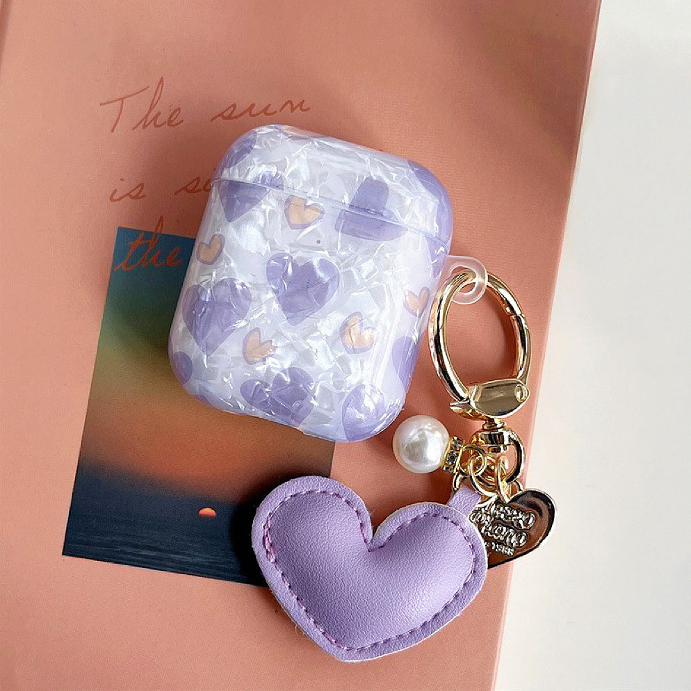 Close-up of Purple Heart Shaped AirPods Case Cover, ideal for gifting and everyday use.
