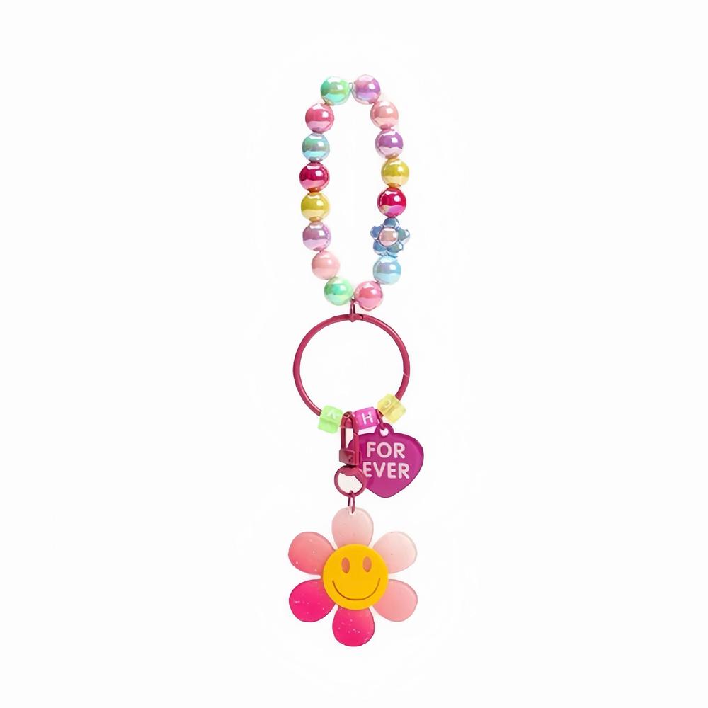 Angled view of Rainbow Beads Sunflower Bag Charm with pink smiley sunflower and colorful beads.