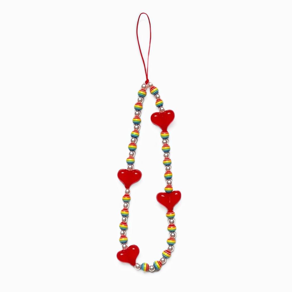 Front view of Rainbow Heart Phone Charm with red hearts and rainbow-striped beads.