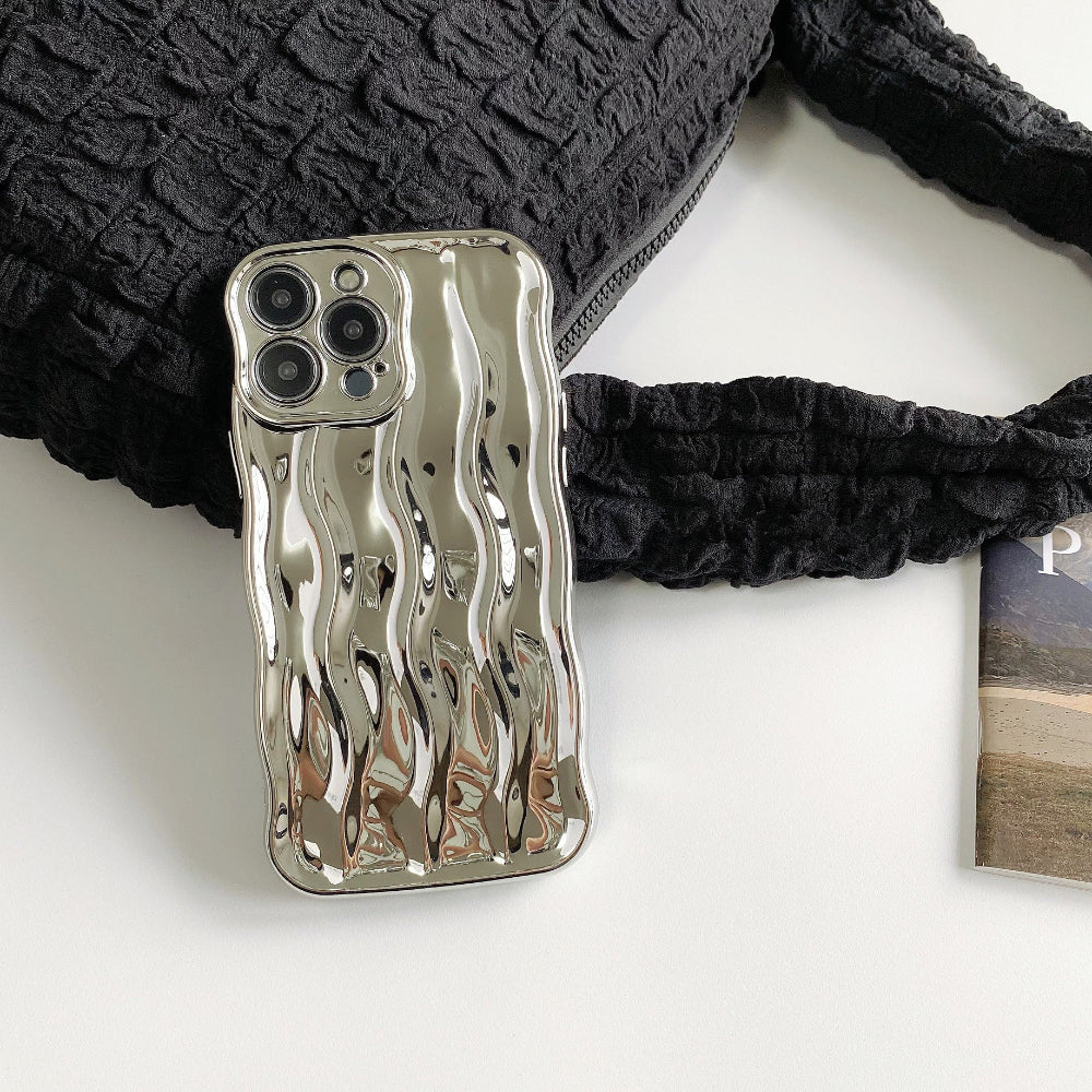 Detailed view of the metallic silver wave phone case.