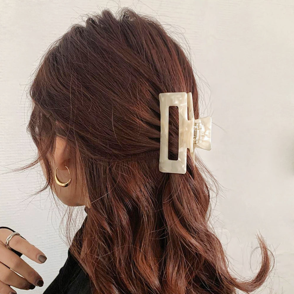 Model wearing Rectangle Hair Claw in white, ideal for quick updos and ponytails.