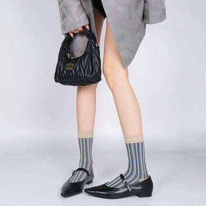 Model wearing a pair of Rocky Stream Socks, great for casual wear and light workouts.