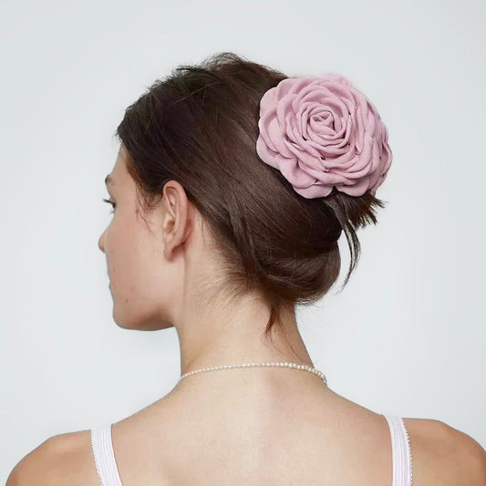 Model wearing a dusty pink Rose Reveries Hair Claw, ideal for everyday outfits and romantic looks.