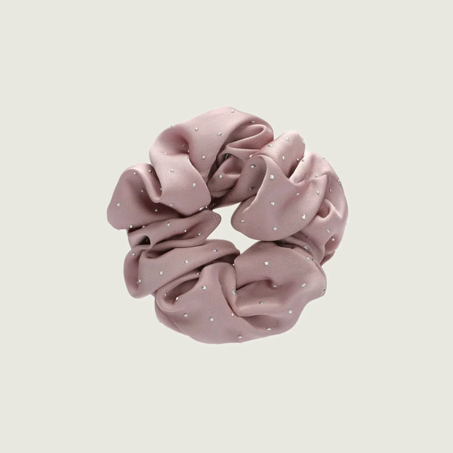 Front view of Satin Scrunchie With Rhinestones in mist pink, easy for workdays and special occasions.