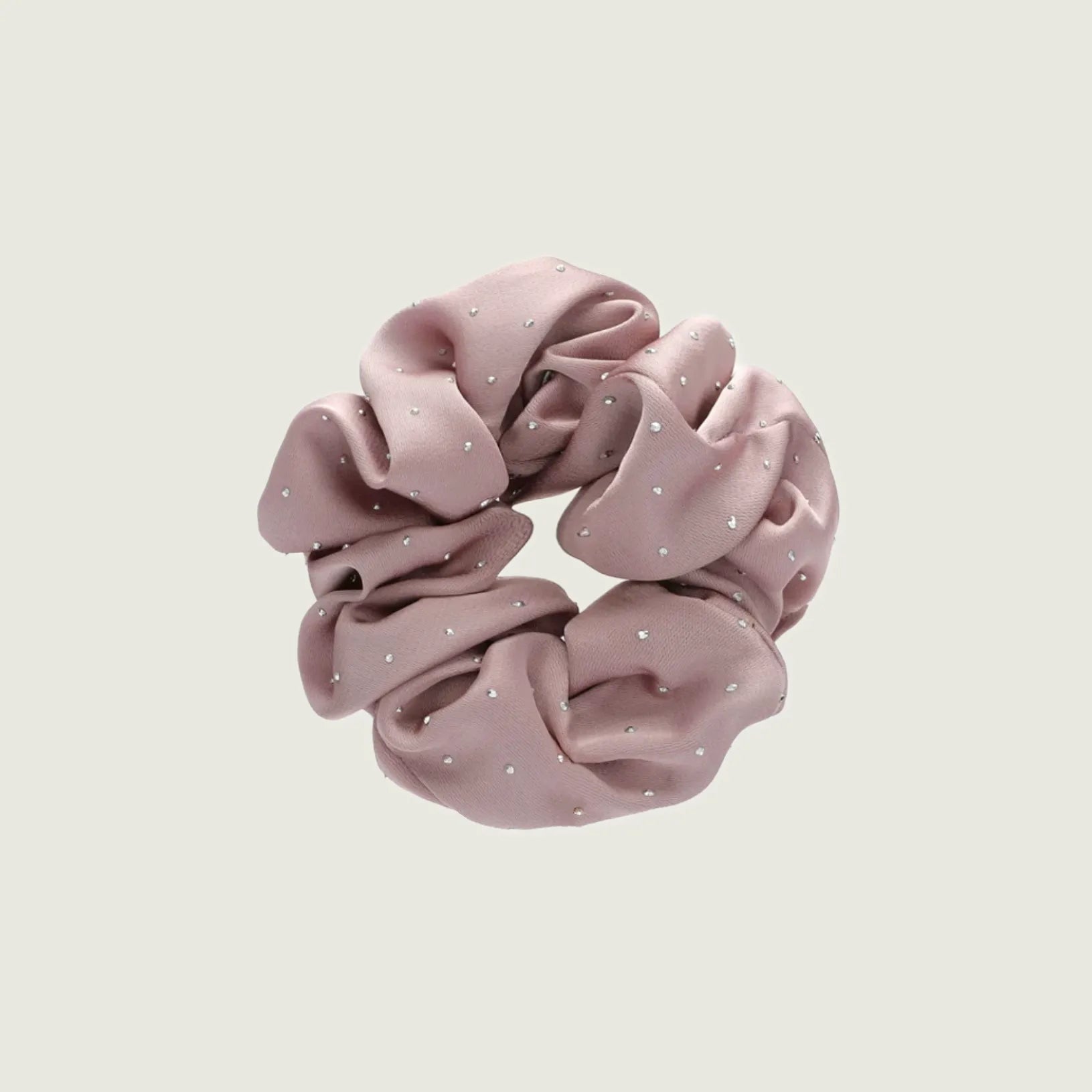 Front view of Satin Scrunchie With Rhinestones in mist pink, easy for workdays and special occasions.