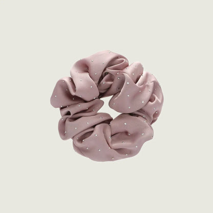 Front view of Satin Scrunchie With Rhinestones in mist pink, easy for workdays and special occasions.