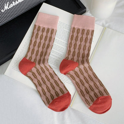 Close-up of Sculptured Ripple Knitted Socks in pink, ideal for workouts and commuting.
