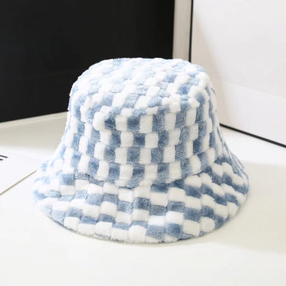 Front view of Sherpa Checkered Bucket Hat in blue, features bold checkered patterns in soft-touch winter fabric.
