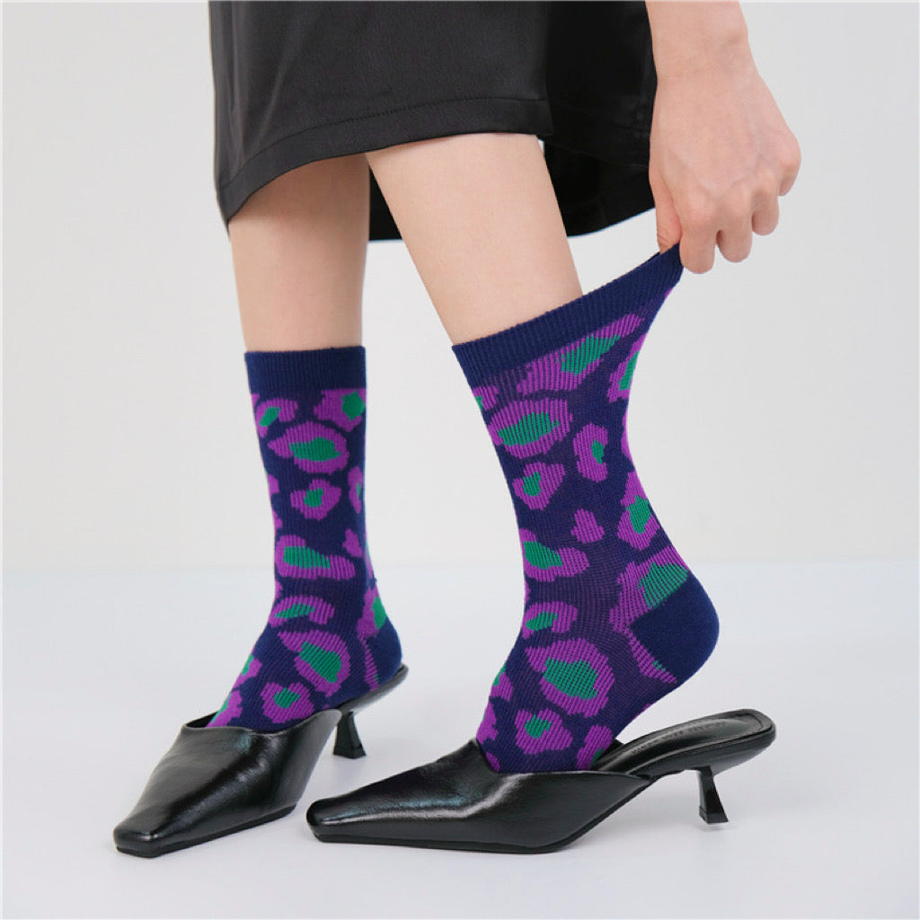 Model wearing a pair of Southern Flower Socks, great for daily wear and lounging.