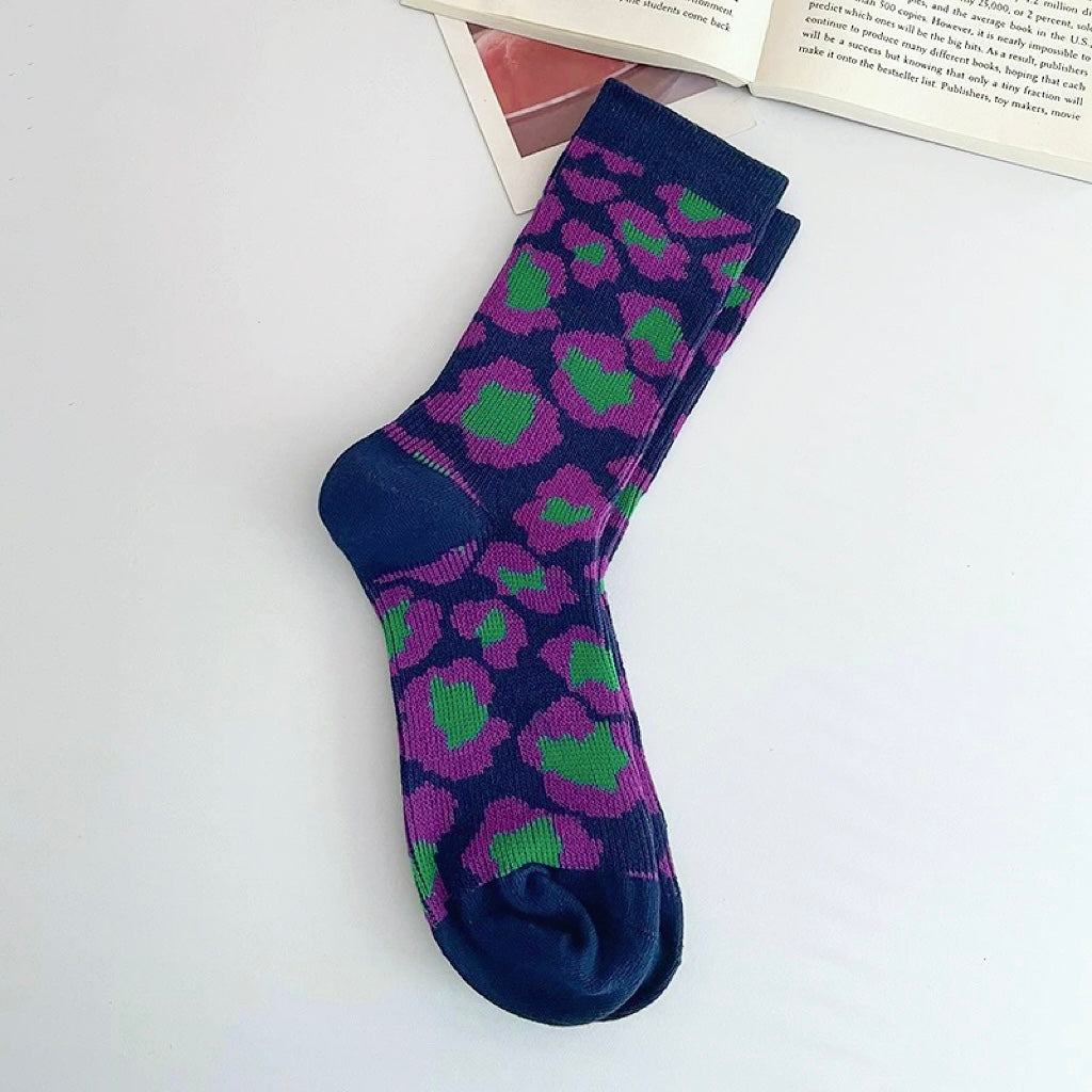 Close-up of Southern Flower Socks in lilac, easy to pack for travel and errands.
