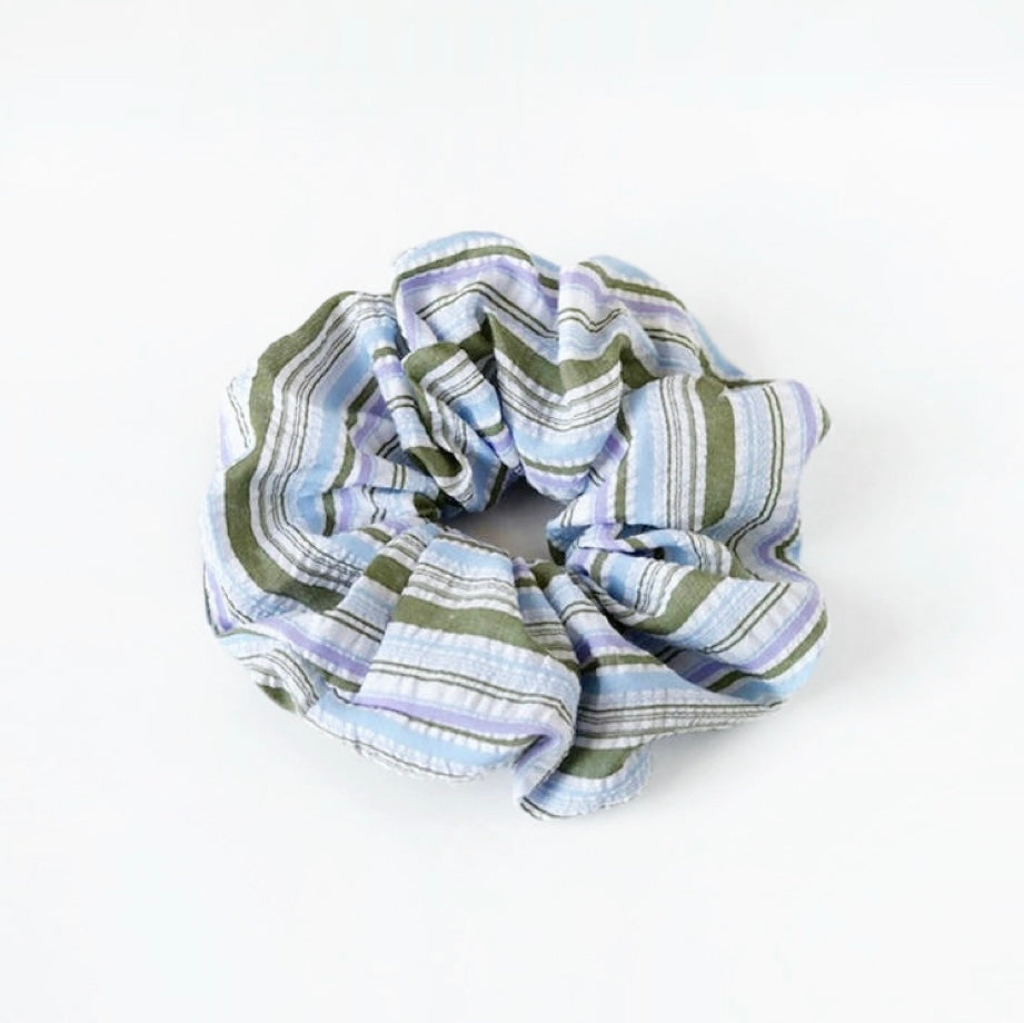 Folded view of Stripe Dream Scrunchie in blue, ideal for quick updos and ponytails.